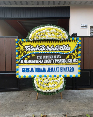 Papan Bunga Duka di Ilaga
